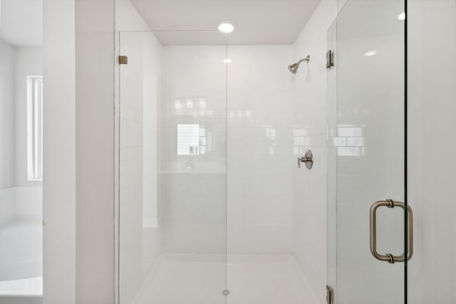 bathroom featuring a stall shower