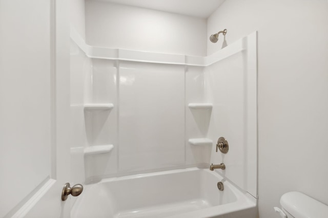 full bathroom featuring shower / tub combination and toilet