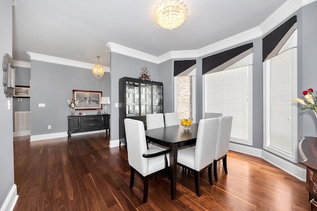18543 Tillman Mill Rd, Athens, AL 35614 - dining space with ornamental molding, wood finished floors, and an inviting chandelier