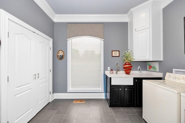 18543 Tillman Mill Rd, Athens, AL 35614 - washroom with a sink, baseboards, cabinet space, tile patterned floors, and crown molding