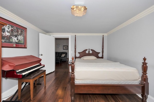 18543 Tillman Mill Rd, Athens, AL 35614 - bedroom featuring ornamental molding, an inviting chandelier, wood finished floors, and baseboards