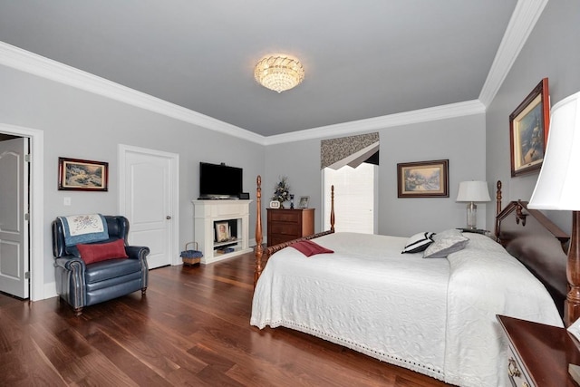 18543 Tillman Mill Rd, Athens, AL 35614 - bedroom with a fireplace, wood finished floors, and crown molding