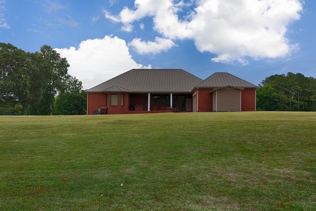 18707 Tillman Mill Rd, Athens, AL 35614 - view of front of house with metal roof, a front lawn, and a standing seam roof