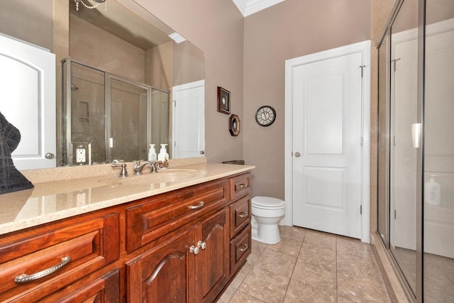 18707 Tillman Mill Rd, Athens, AL 35614 - bathroom featuring toilet, ornamental molding, a stall shower, vanity, and tile patterned floors