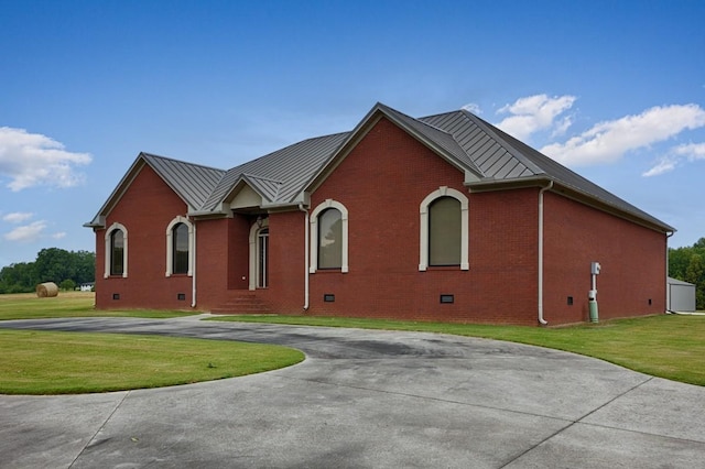 18707 Tillman Mill Rd, Athens, AL 35614 - view of front of property featuring metal roof, brick siding, crawl space, a standing seam roof, and a front yard