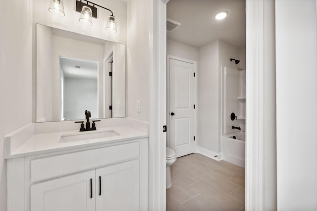 full bath with shower / washtub combination, visible vents, vanity, and toilet