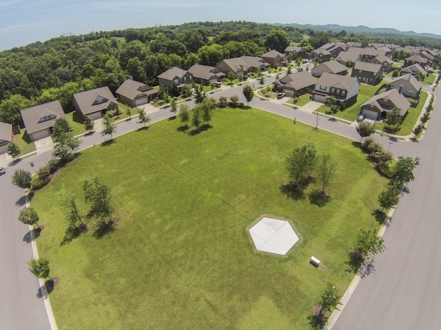 birds eye view of property with a residential view