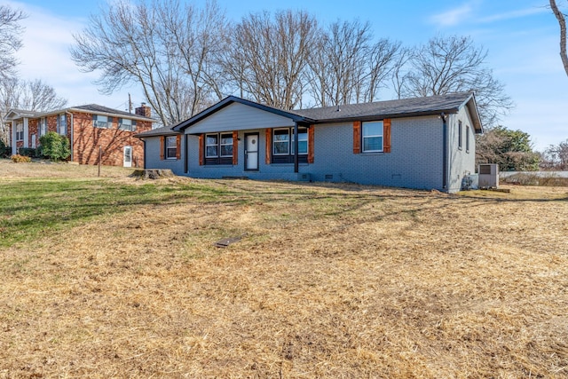 ranch-style house featuring brick siding, crawl space, a front yard, and central air condition unit