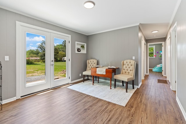 100 Eleazer Dr, Dickson, TN 37055 - living area with crown molding, baseboards, french doors, and wood finished floors