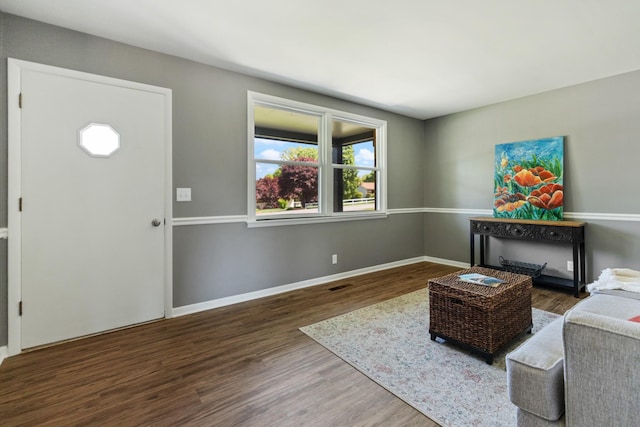 100 Eleazer Dr, Dickson, TN 37055 - living area featuring baseboards, plenty of natural light, wood finished floors, and visible vents