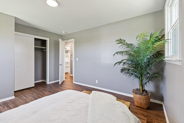 100 Eleazer Dr, Dickson, TN 37055 - bedroom featuring baseboards, multiple windows, and wood finished floors