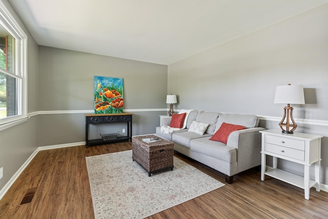 100 Eleazer Dr, Dickson, TN 37055 - living area featuring baseboards, wood finished floors, and visible vents