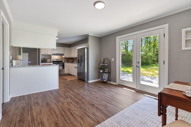 100 Eleazer Dr, Dickson, TN 37055 - interior space featuring crown molding, a peninsula, dark wood-type flooring, french doors, and stainless steel appliances