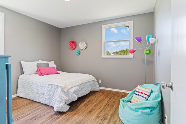 100 Eleazer Dr, Dickson, TN 37055 - bedroom with baseboards and wood finished floors