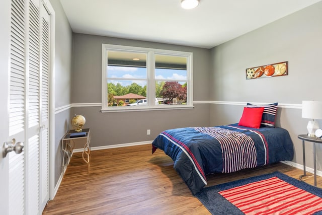 100 Eleazer Dr, Dickson, TN 37055 - bedroom featuring baseboards and wood finished floors