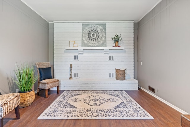 100 Eleazer Dr, Dickson, TN 37055 - living area featuring crown molding, visible vents, and wood finished floors