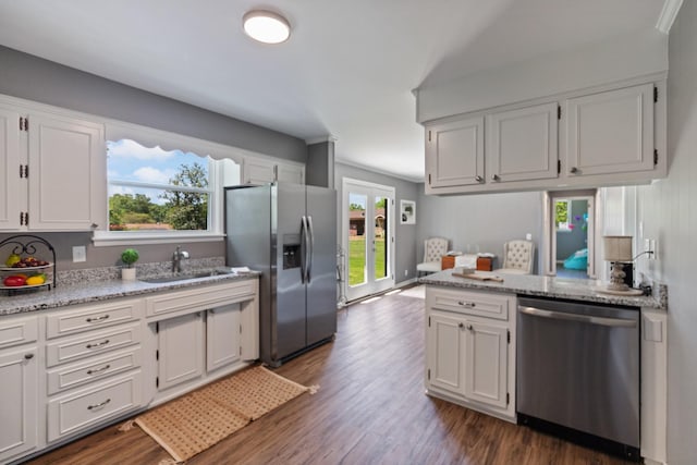 100 Eleazer Dr, Dickson, TN 37055 - kitchen with a sink, appliances with stainless steel finishes, dark wood-style floors, and white cabinetry