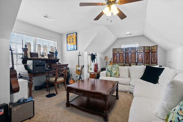 living area featuring a ceiling fan, visible vents, vaulted ceiling, and carpet flooring