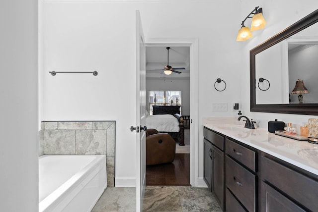 bathroom featuring a garden tub, connected bathroom, a sink, a ceiling fan, and double vanity