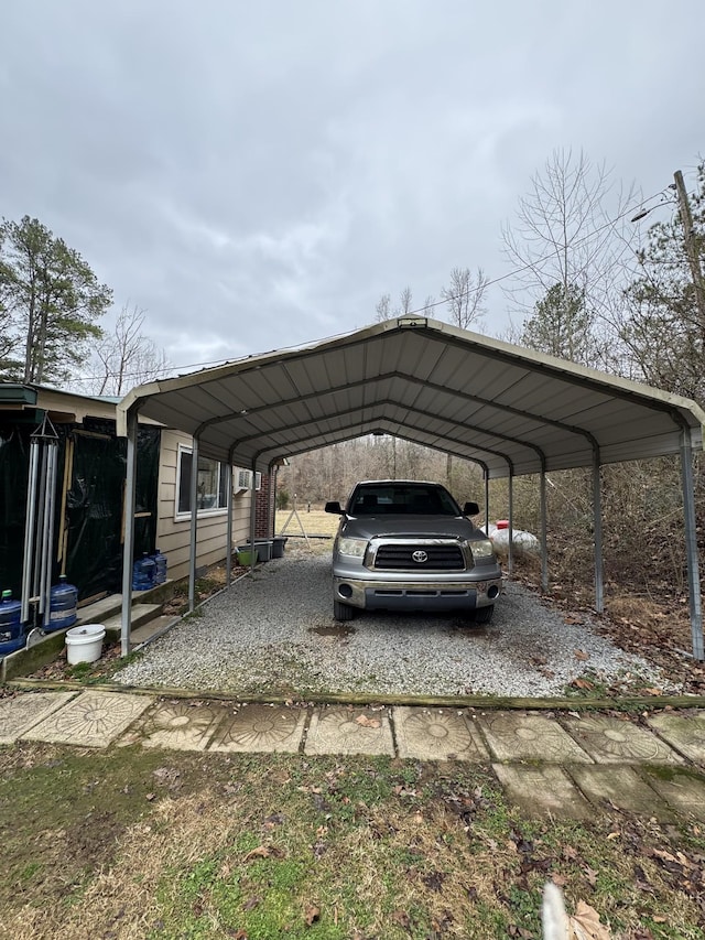 view of vehicle parking with a detached carport