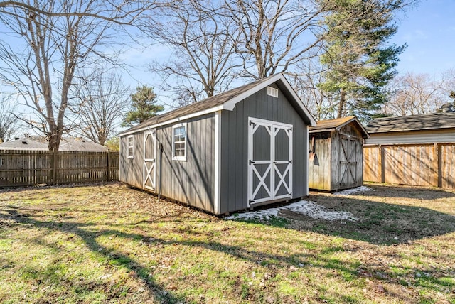 view of shed featuring a fenced backyard