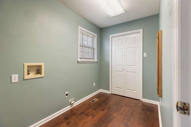 laundry room featuring laundry area, washer hookup, baseboards, dark wood-style floors, and electric dryer hookup