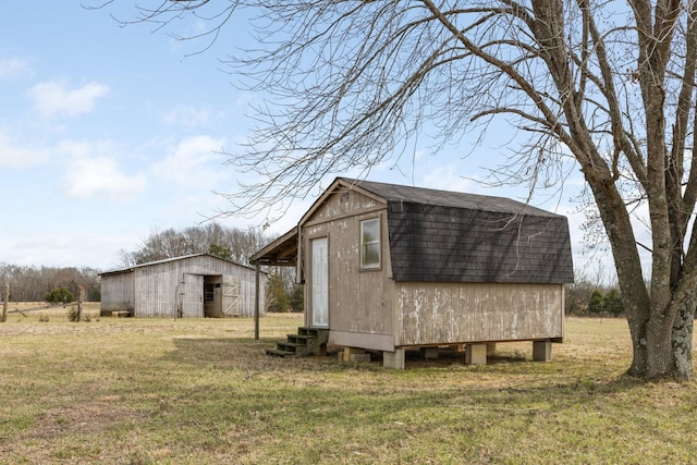 view of outbuilding featuring an outdoor structure