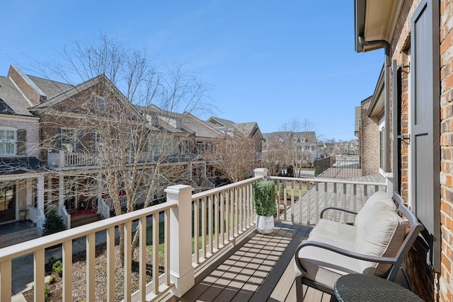 balcony featuring a residential view