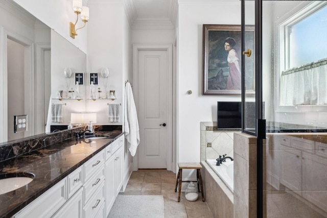 full bathroom featuring ornamental molding, a garden tub, a sink, and double vanity