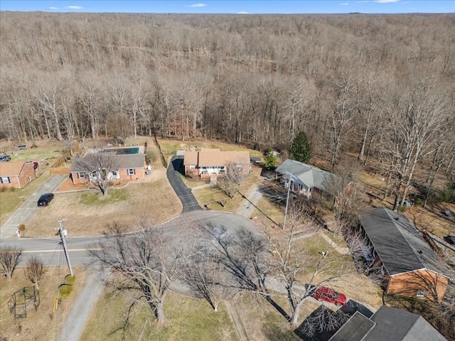 bird's eye view featuring a forest view