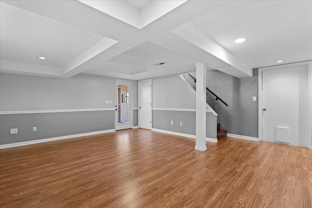 interior space featuring stairway, recessed lighting, wood finished floors, and baseboards