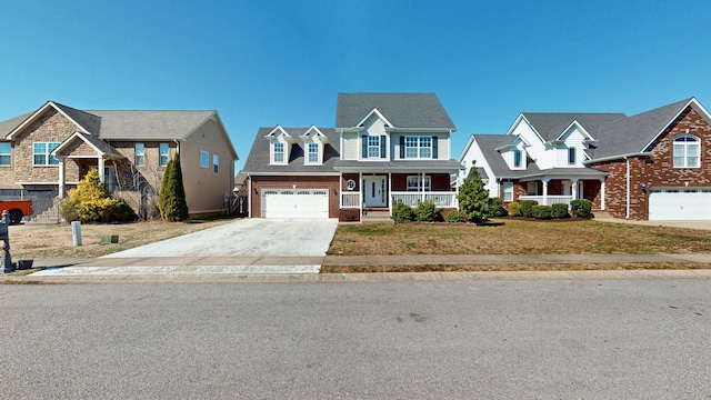 view of front of home with a porch, a garage, brick siding, concrete driveway, and a front yard