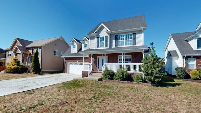 view of front of home featuring driveway, a porch, a front lawn, and brick siding