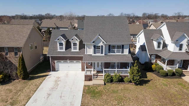 view of front of property featuring a porch, brick siding, concrete driveway, a residential view, and a front lawn