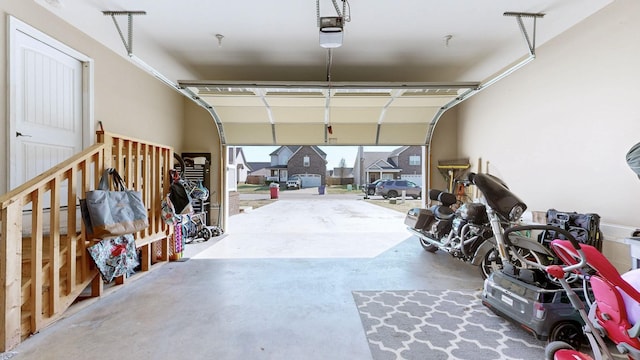 garage featuring a garage door opener