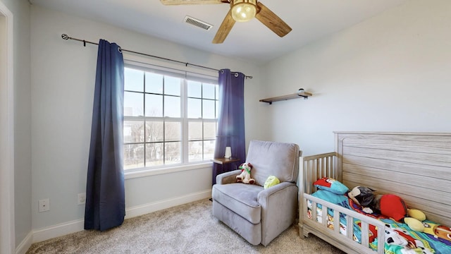 bedroom featuring a ceiling fan, baseboards, visible vents, and carpet flooring