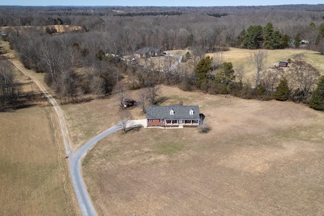 birds eye view of property featuring a rural view