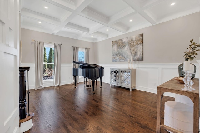 sitting room with recessed lighting, beamed ceiling, and wood finished floors