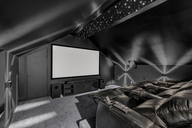 cinema featuring carpet floors and lofted ceiling