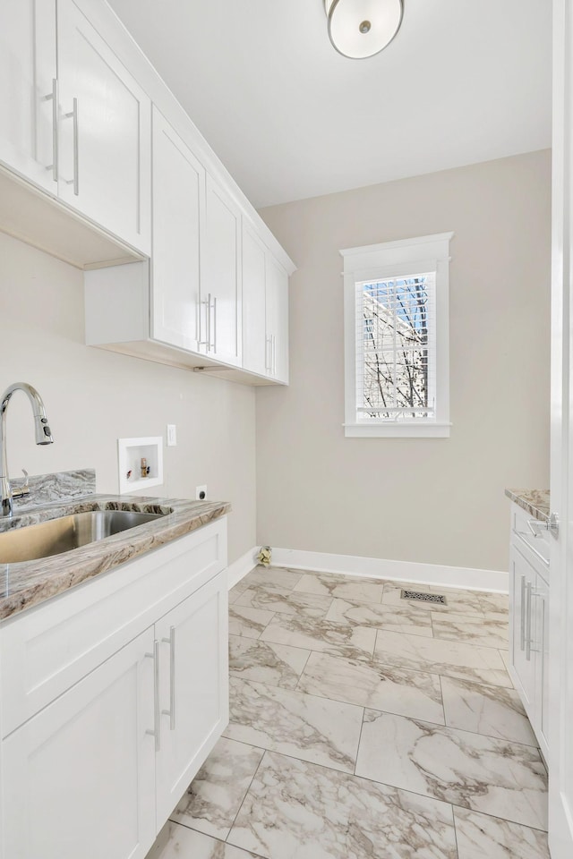 5704 Old Harding Pike, Nashville, TN 37205 - laundry area featuring electric dryer hookup, a sink, hookup for a washing machine, baseboards, and marble finish floor