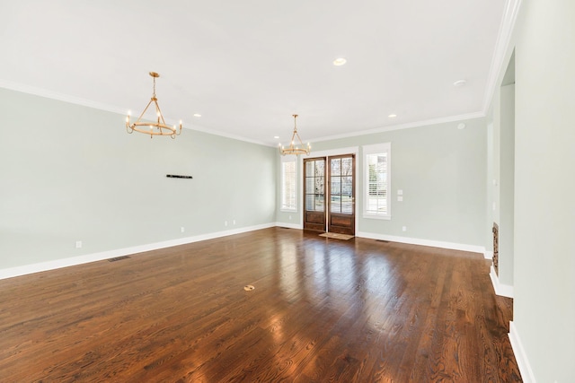 5704 Old Harding Pike, Nashville, TN 37205 - spare room with visible vents, dark wood finished floors, an inviting chandelier, crown molding, and baseboards