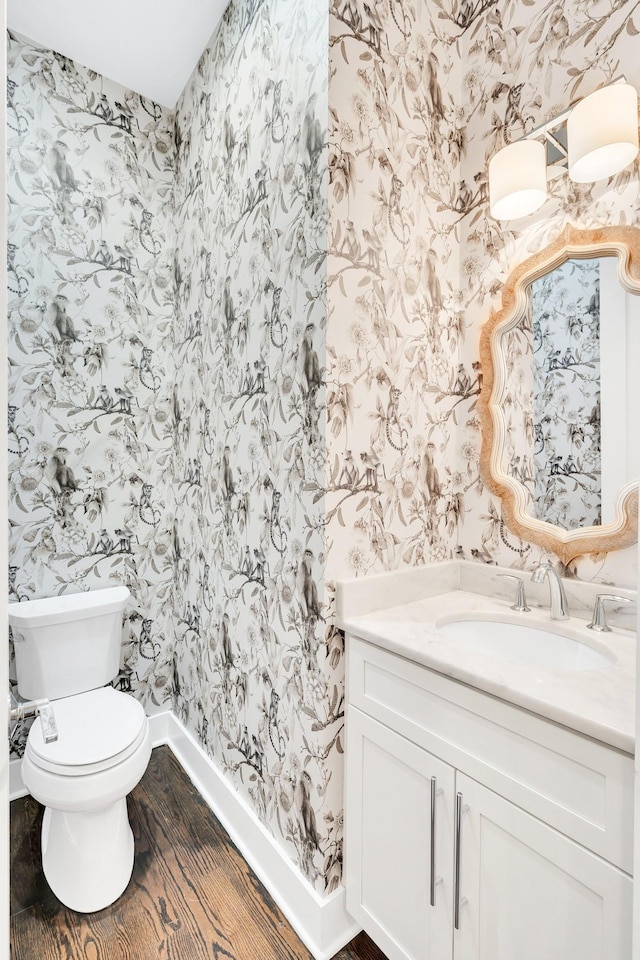 5704 Old Harding Pike, Nashville, TN 37205 - half bathroom with wallpapered walls, toilet, baseboards, and vanity