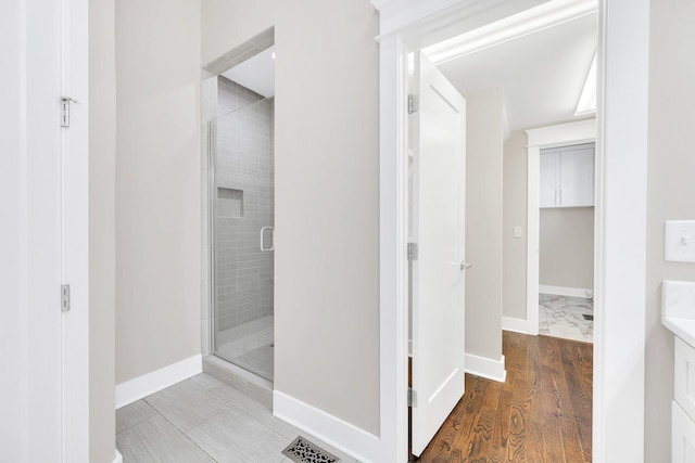 5704 Old Harding Pike, Nashville, TN 37205 - full bath with a shower stall, baseboards, vanity, and visible vents