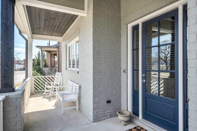 5704 Old Harding Pike, Nashville, TN 37205 - entrance to property with a porch and brick siding