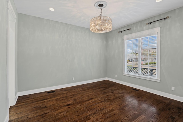 5704 Old Harding Pike, Nashville, TN 37205 - spare room with an inviting chandelier, baseboards, dark wood-style floors, and visible vents