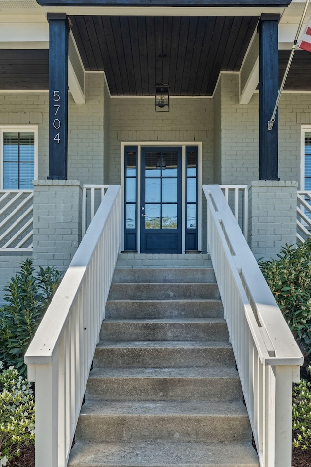 5704 Old Harding Pike, Nashville, TN 37205 - property entrance with brick siding and a porch