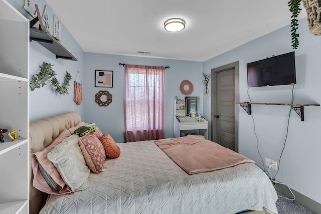 bedroom with visible vents