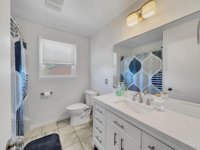 full bath with curtained shower, vanity, toilet, and baseboards