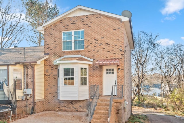 view of front facade with brick siding