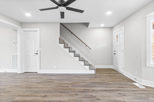 entryway featuring recessed lighting, visible vents, and wood finished floors